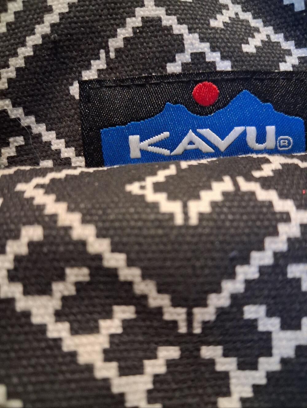 WONDERFUL " KAVU" SLINGBAG OR BACKPACK. BLACK AND WHITE GEOMETRIC DESIGN.